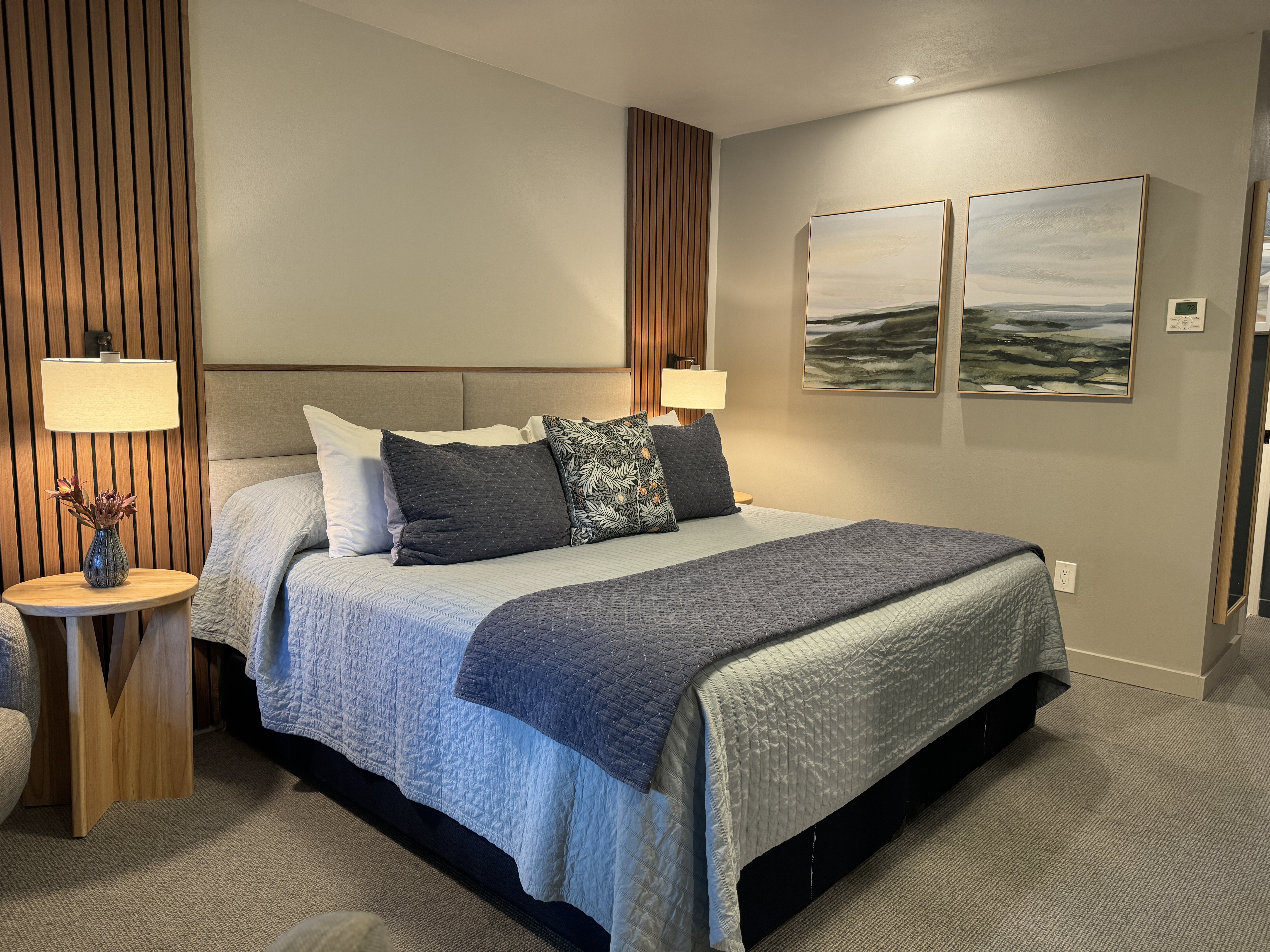 a king size bed in a modern hotel room